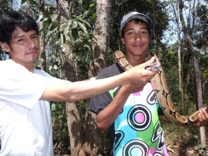 Alex Holding the Snake - near Puerto Maldonado, Peru | Soundview B&B