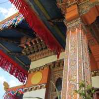 This kind of elaborate carving and painting is typical Bhutanese decoration, inside and out, in temples and in homes.